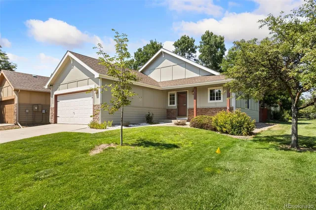 a house view with a garden space