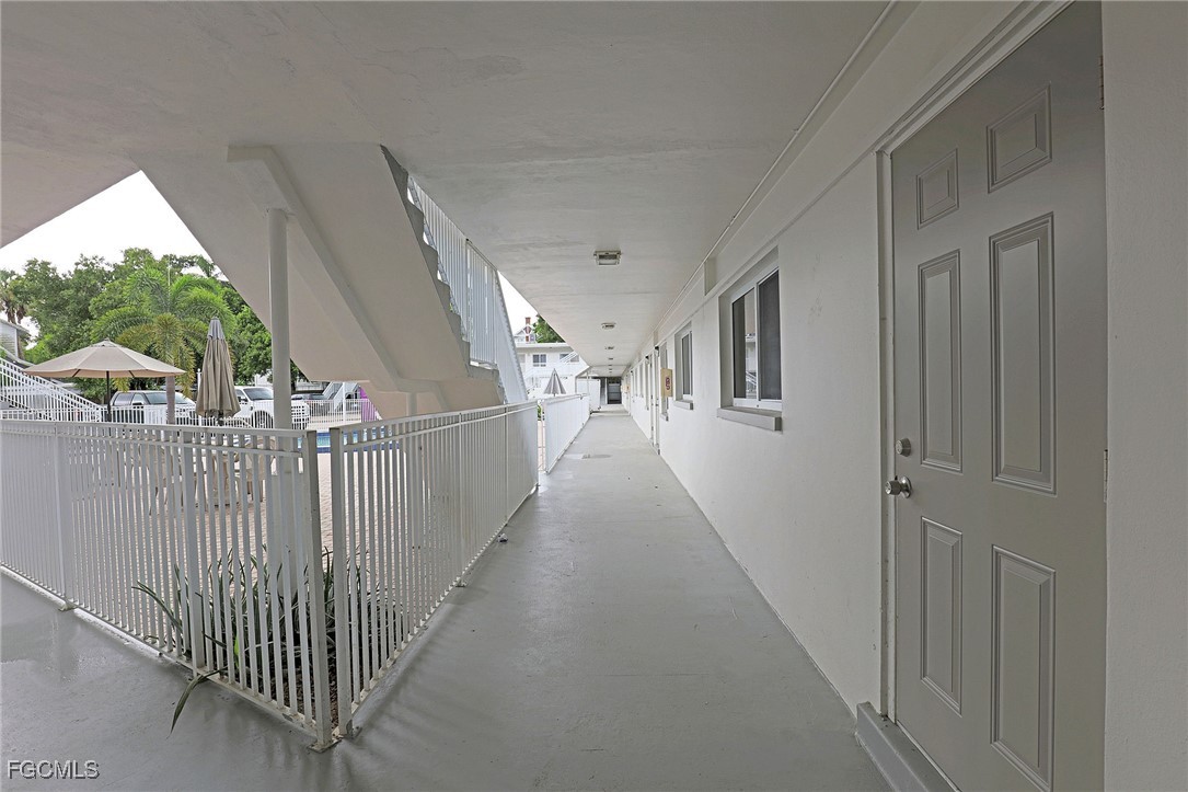 2590 First Street, Unit 105 Fort Myers, FL 33901 - Photo 3 of 13 a view of a stairs and an entrance