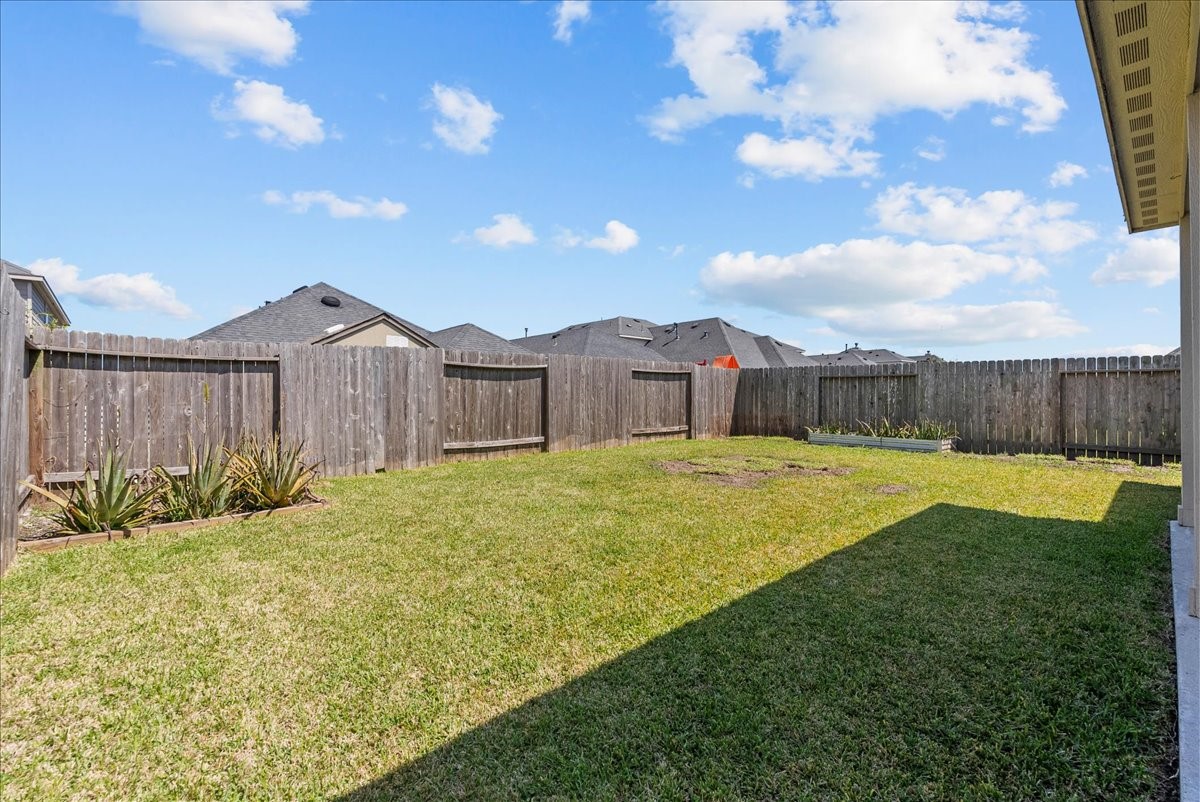 5111 Bay Lane Bacliff, TX 77518 - Photo 35 of 48 a swimming pool with wooden fence