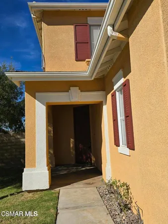a front view of a house with a garage