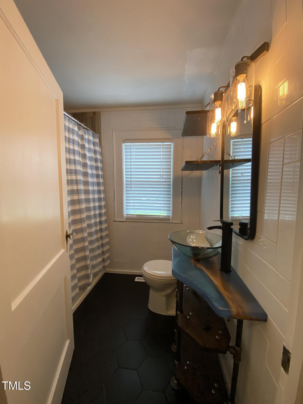 602 Roxboro Road Haw River, NC 27258 - Photo 14 of 28 Hall bath w hand made black walnut counter top!