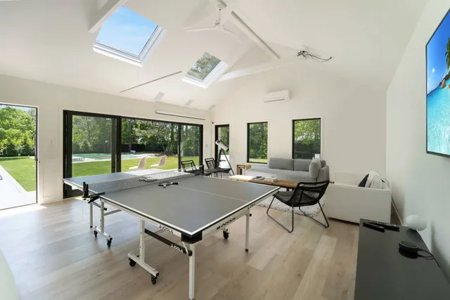 a view of a livingroom with furniture and window