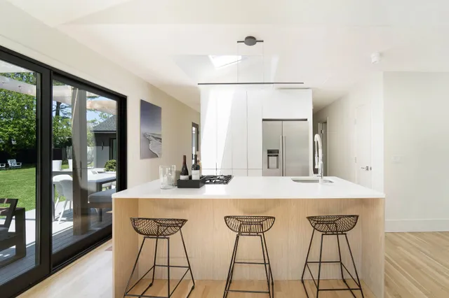 a view of a dining room with furniture and window