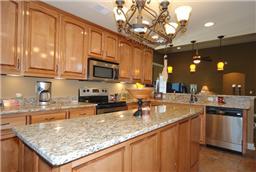 Magnificent Kitchen with granite counter tops, Beautiful Cabinetry, complete separate Pantry, Stainless Stell appliances