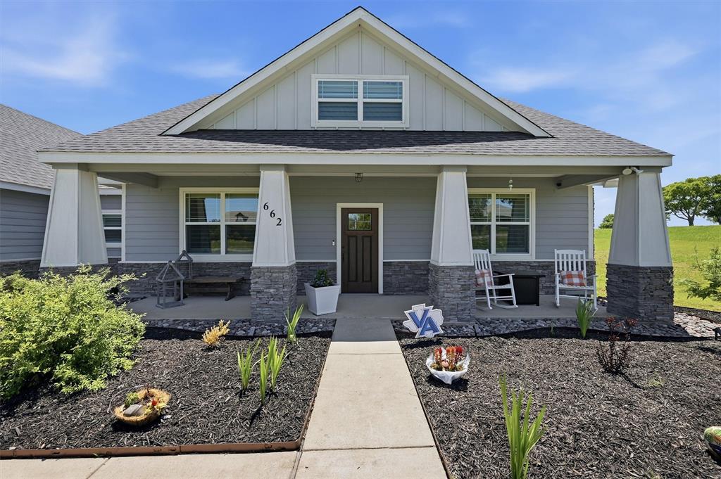 662 Preakness Place Road Van Alstyne, TX 75495 - Photo 4 of 39 a front view of a house with garden