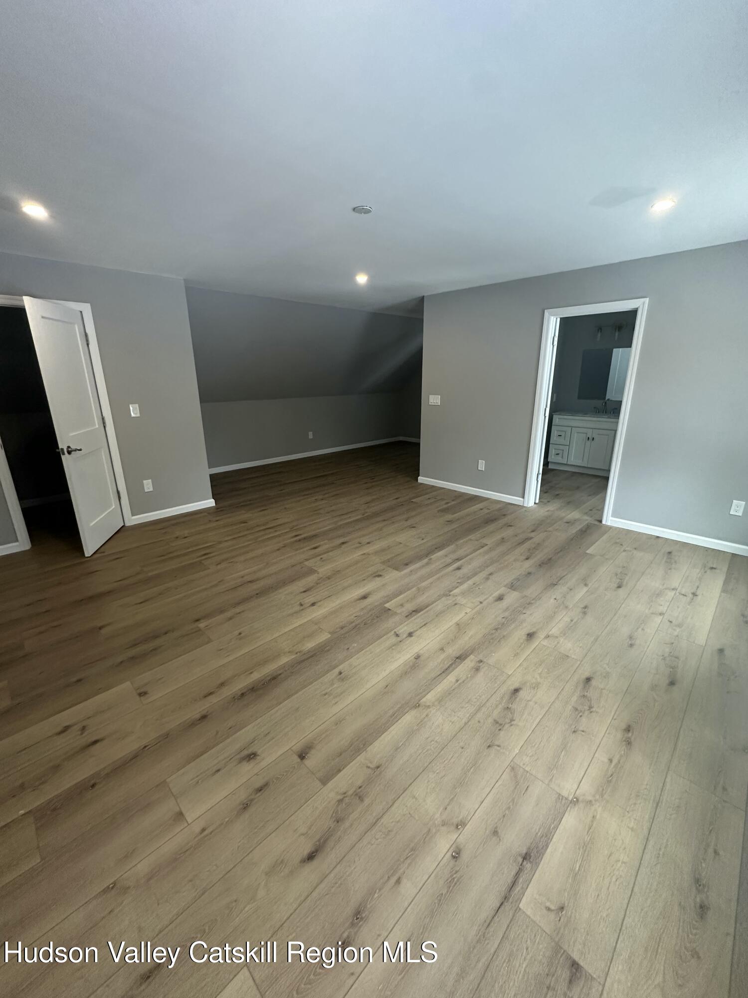 20 Olivers Way Cairo, NY 12413 - Photo 17 of 20 wooden floor in an empty room