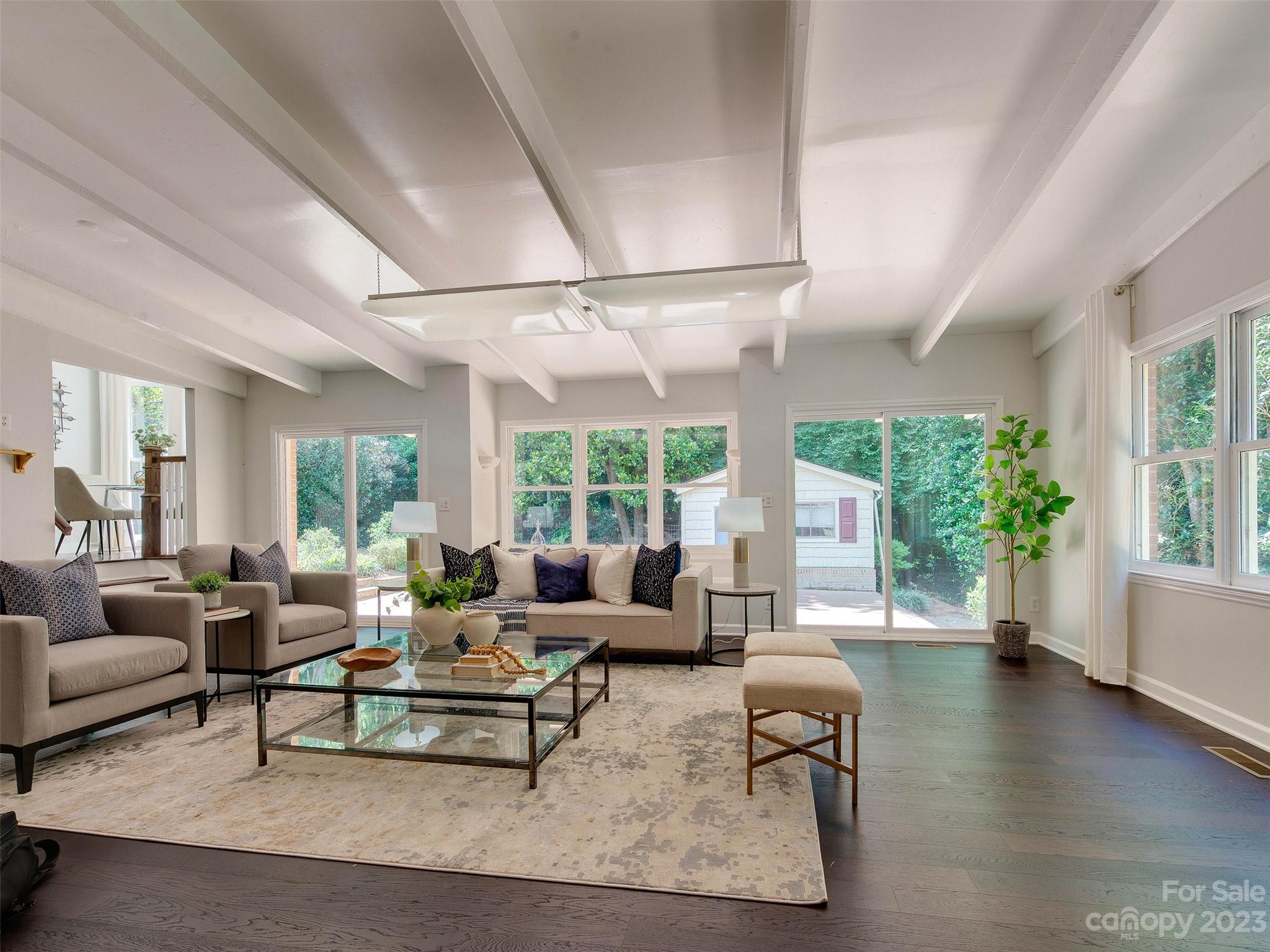 2916 Goneaway Road Charlotte, NC 28210 - Photo 13 of 48 a living room with furniture and a large window