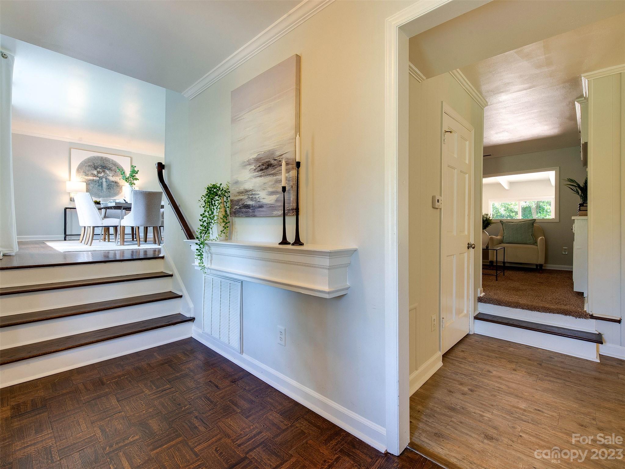 2916 Goneaway Road Charlotte, NC 28210 - Photo 4 of 48 a view of entryway and hall with wooden floor