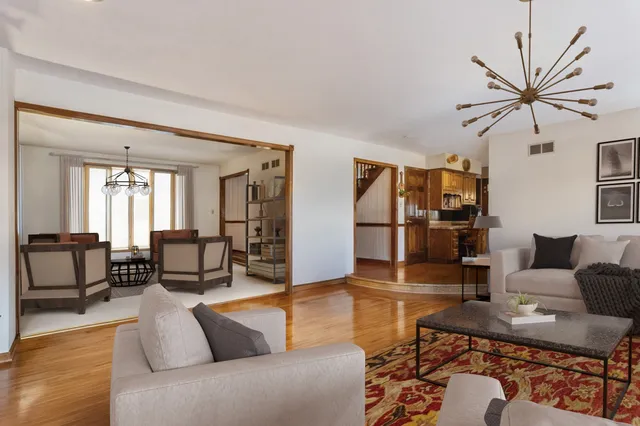 a living room with furniture and a rug