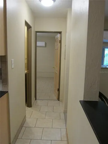 a bathroom with a granite countertop window