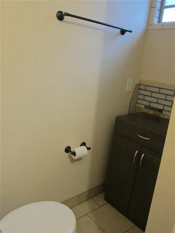 a bathroom with a toilet