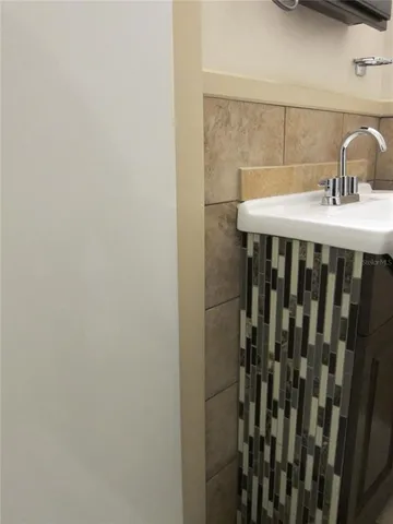 a kitchen with a stove and a microwave