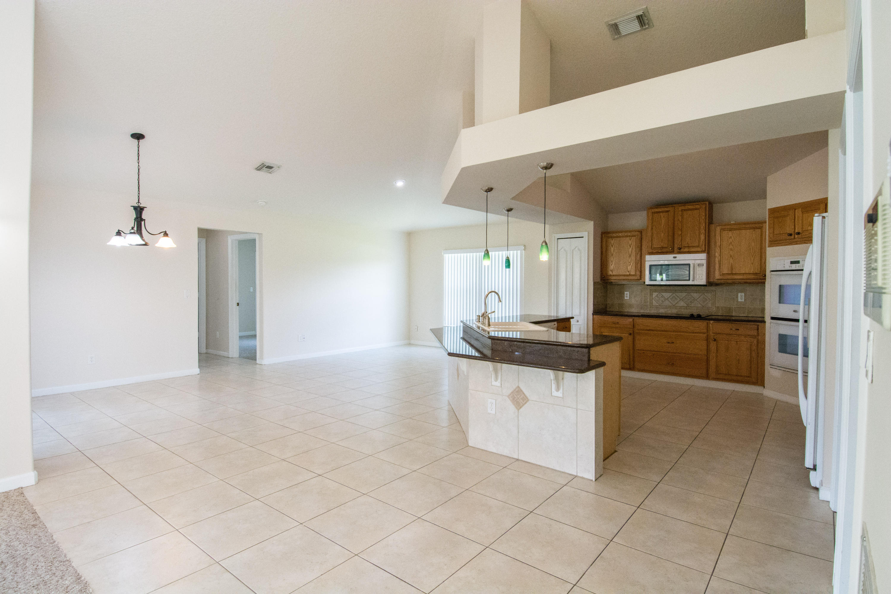 1092 Southwest Fenway Road Port St. Lucie, FL 34953 - Photo 20 of 40 04_Dining Room