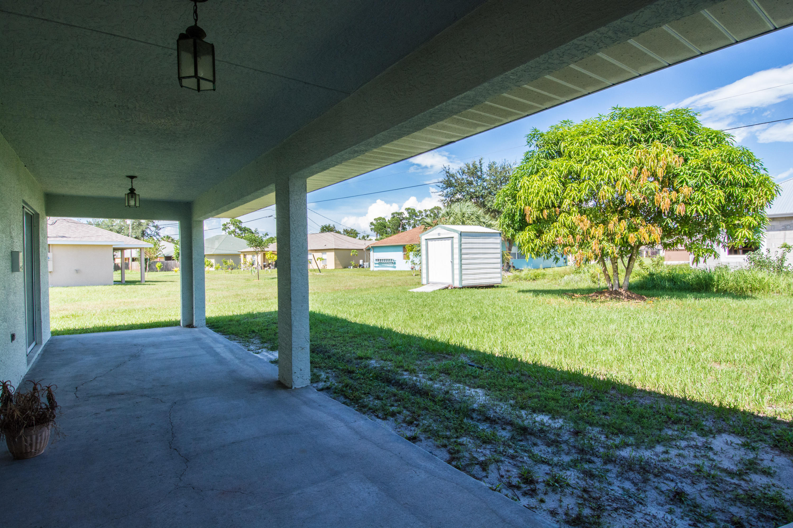 1092 Southwest Fenway Road Port St. Lucie, FL 34953 - Photo 40 of 40 12_Pool-Yard (1)
