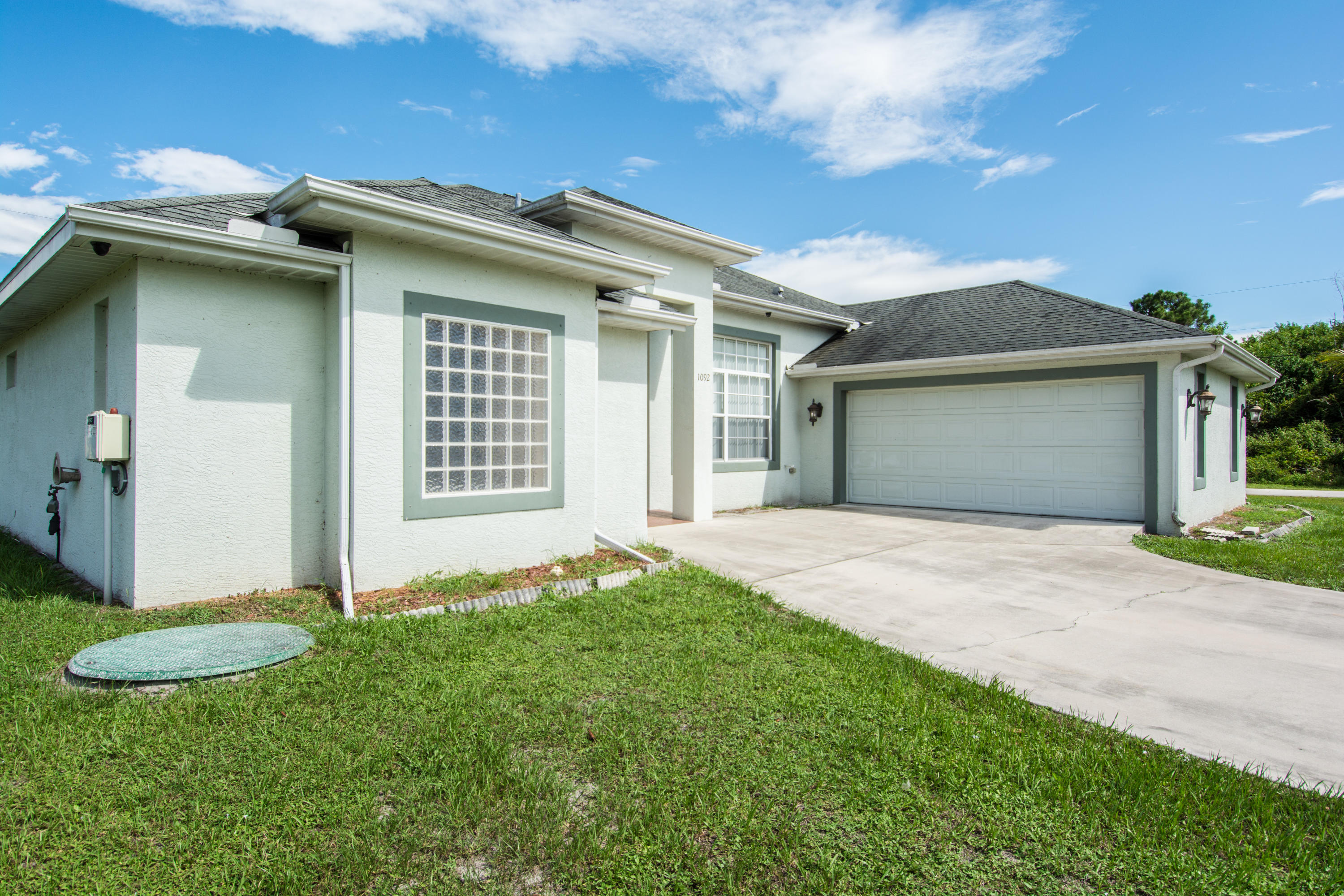 1092 Southwest Fenway Road Port St. Lucie, FL 34953 - Photo 9 of 40 00_Curbshot (7)