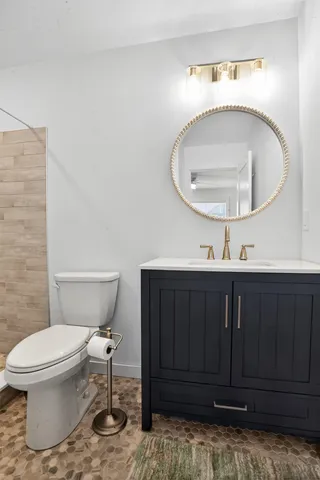 a view of a house with backyard and a space