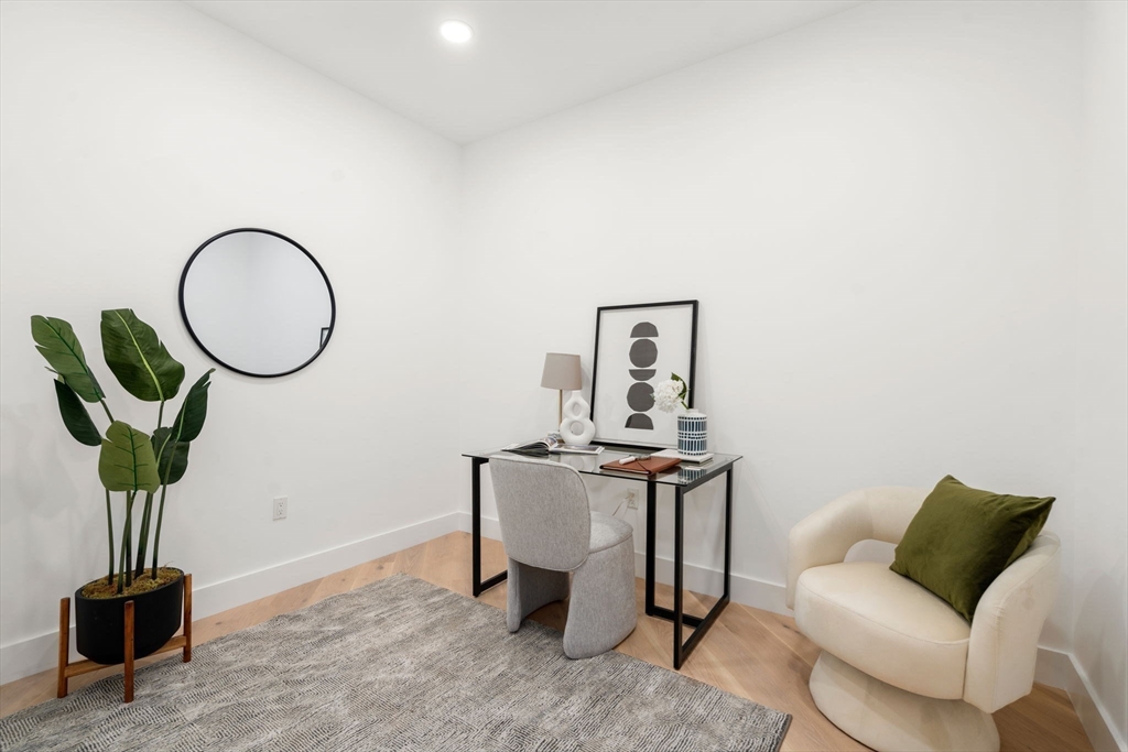 16 Stearns Road, Unit 101 Wellesley, MA 02482 - Photo 11 of 18 a living room with furniture