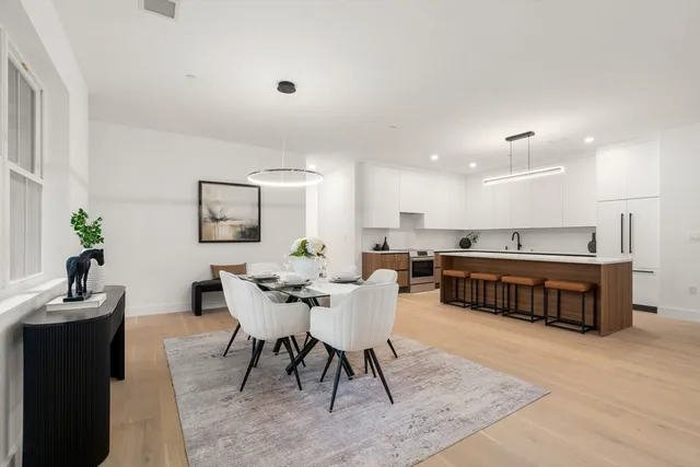 a view of a dining room with furniture