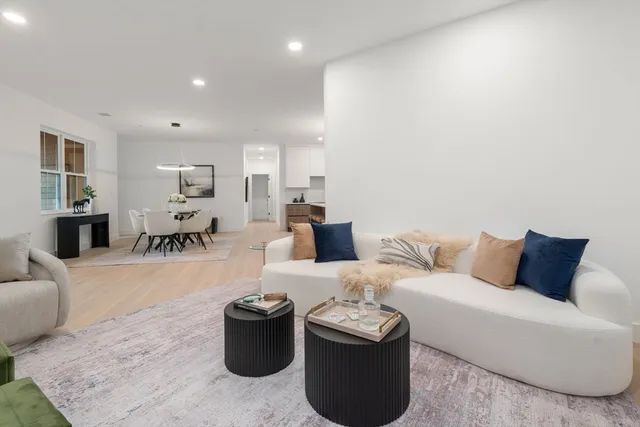 a living room with furniture and a couch