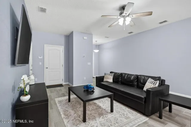a bathroom with a sink toilet and mirror