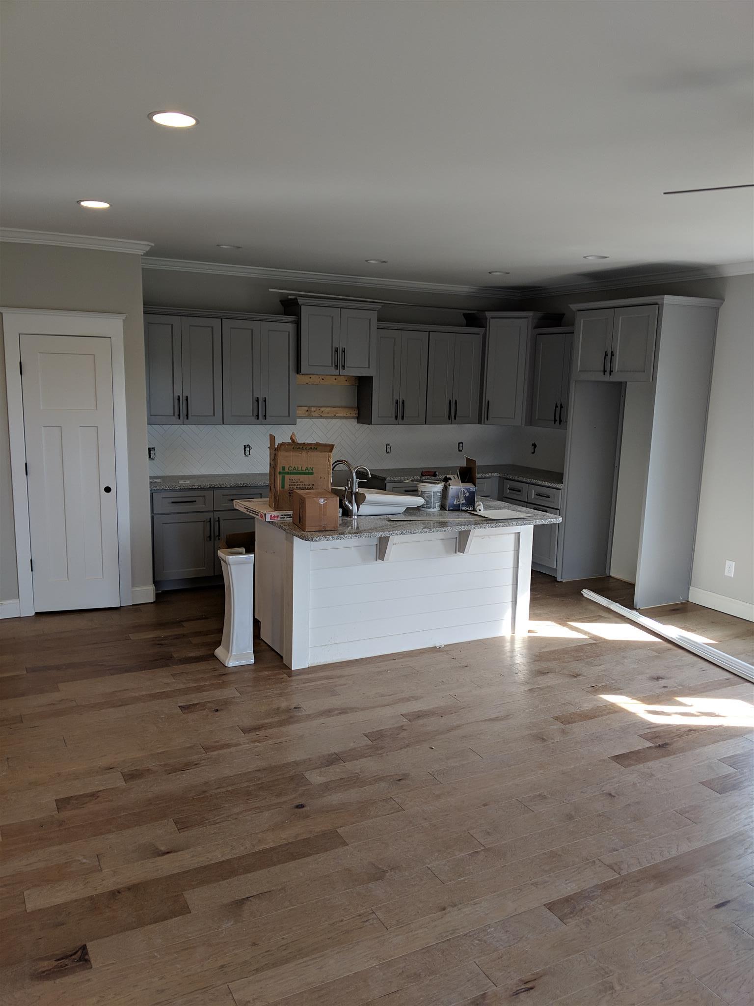 Please excuse our mess!  The Kitchen is open to the Family Room