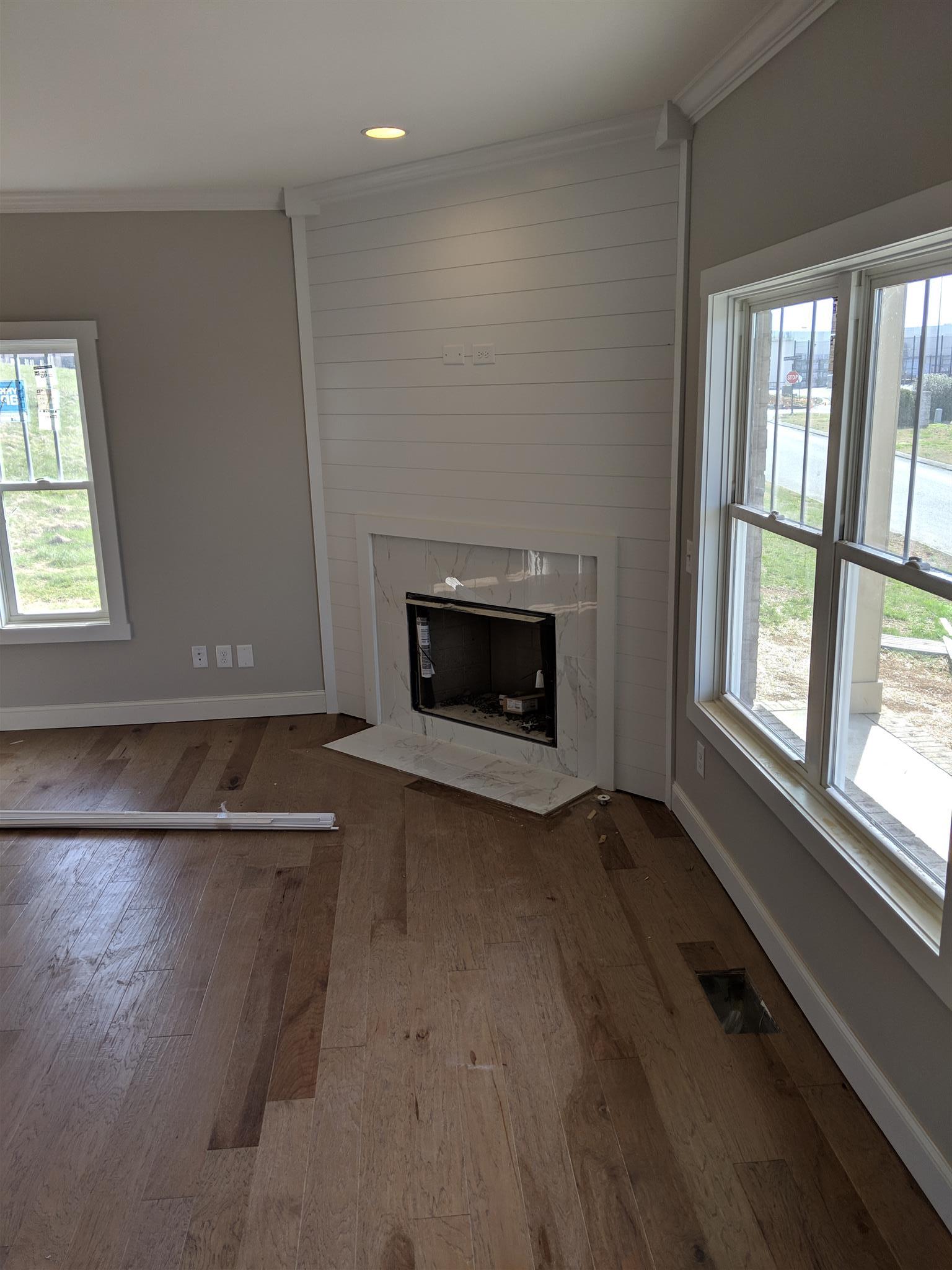 Family Room w/ hardwood flooring