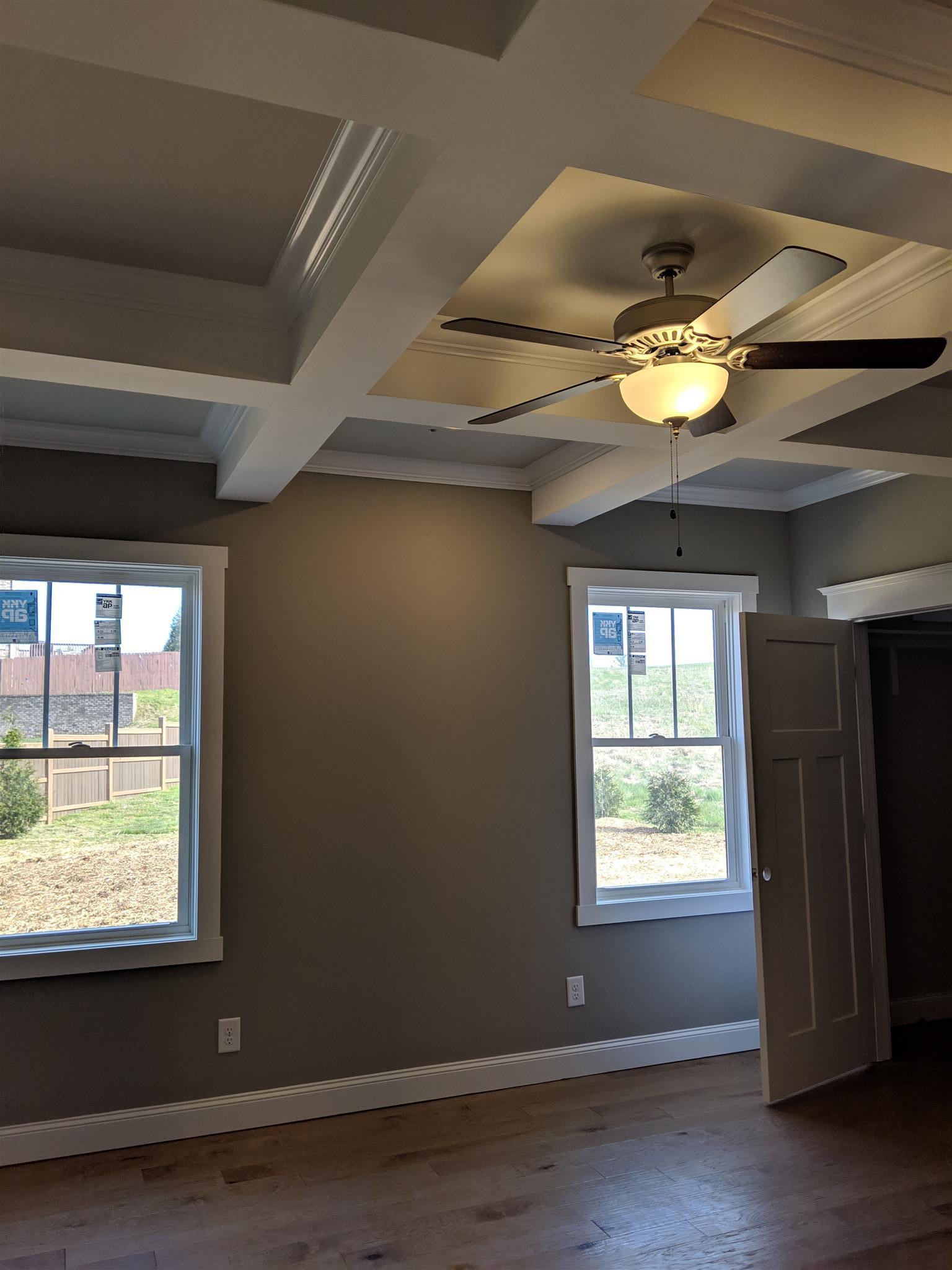 1004 Red Pepper Ridge Spring Hill, TN 37174 - Photo 8 of 27 Master Bedroom on the main level w/ coffered ceiling