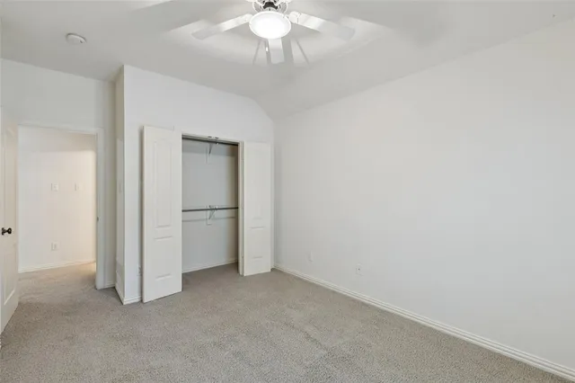 an empty room with a bathroom