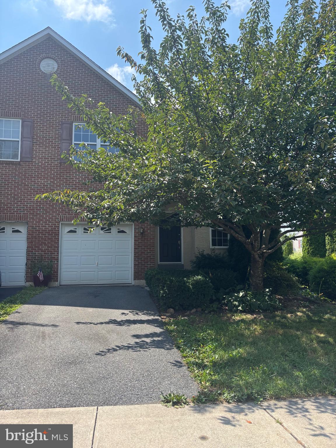 6846 Hunt Drive Macungie, PA 18062 - Photo 3 of 28 a front view of a house with garden