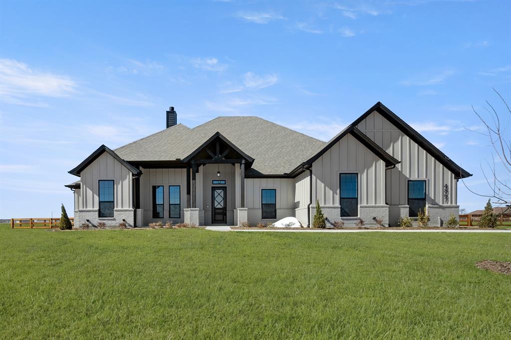 4867 Prairie Sky Lane DISH, TX 76247 - Photo 1 of 27 a front view of house with yard and green space