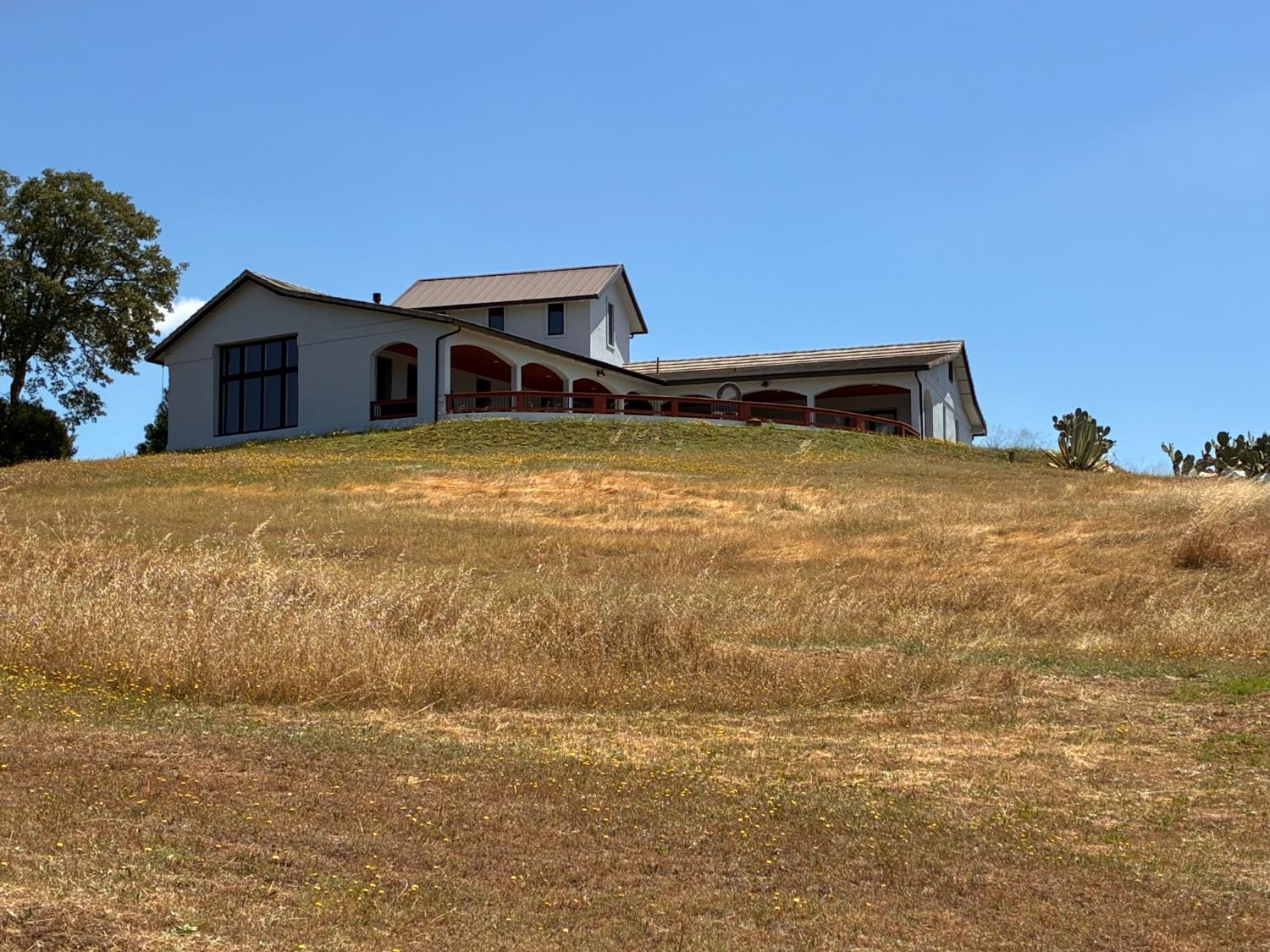 15070 Willow Creek Road Ione, CA 95640 - Photo 3 of 66 a front view of a house with a yard