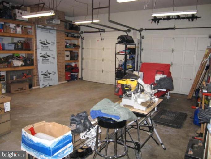 13240 Olivet Road Lusby, MD 20657 - Photo 14 of 24 a workspace with furniture