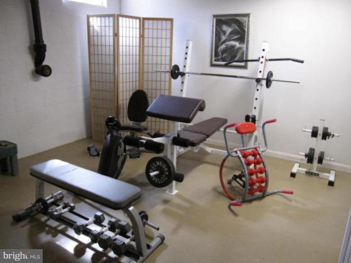 13240 Olivet Road Lusby, MD 20657 - Photo 20 of 24 a room with gym equipment