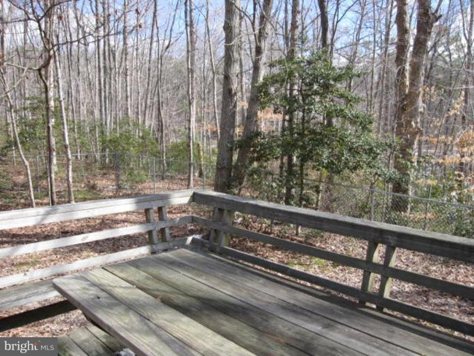 13240 Olivet Road Lusby, MD 20657 - Photo 22 of 24 a view of a street with sitting area