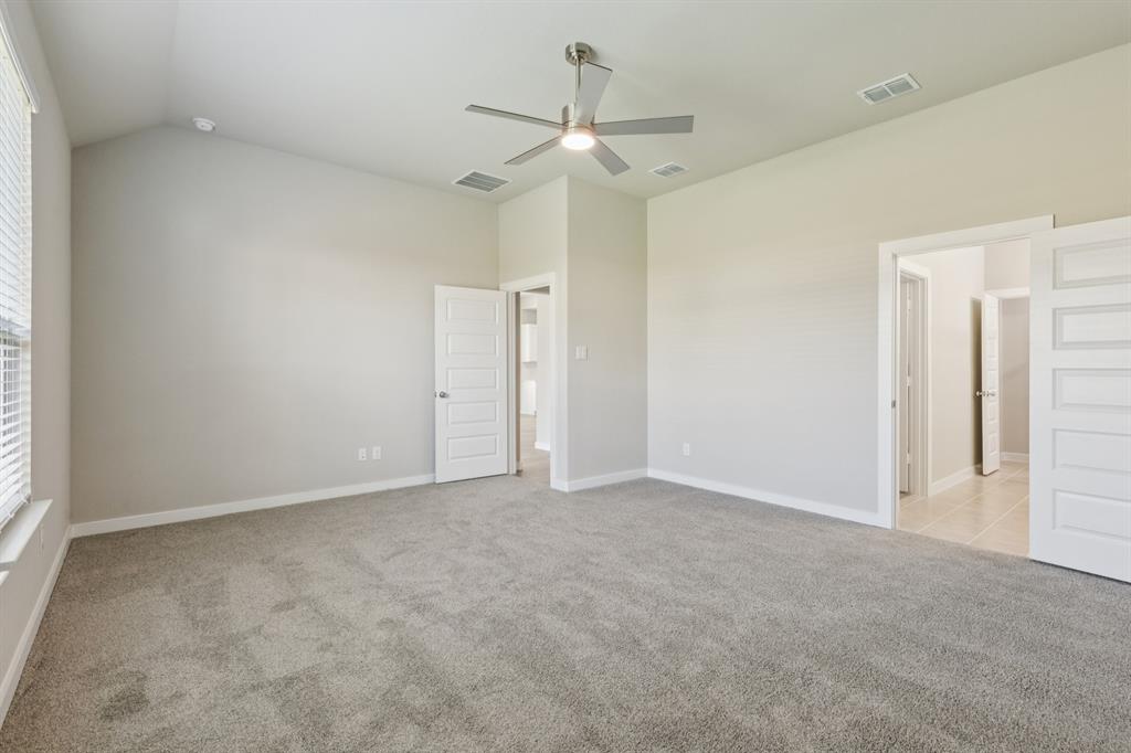 15212 Supreme Street Aledo, TX 76008 - Photo 19 of 34 Primary Suite in the Stanley II home plan by Trophy Signature Homes – REPRESENTATIVE PHOTO