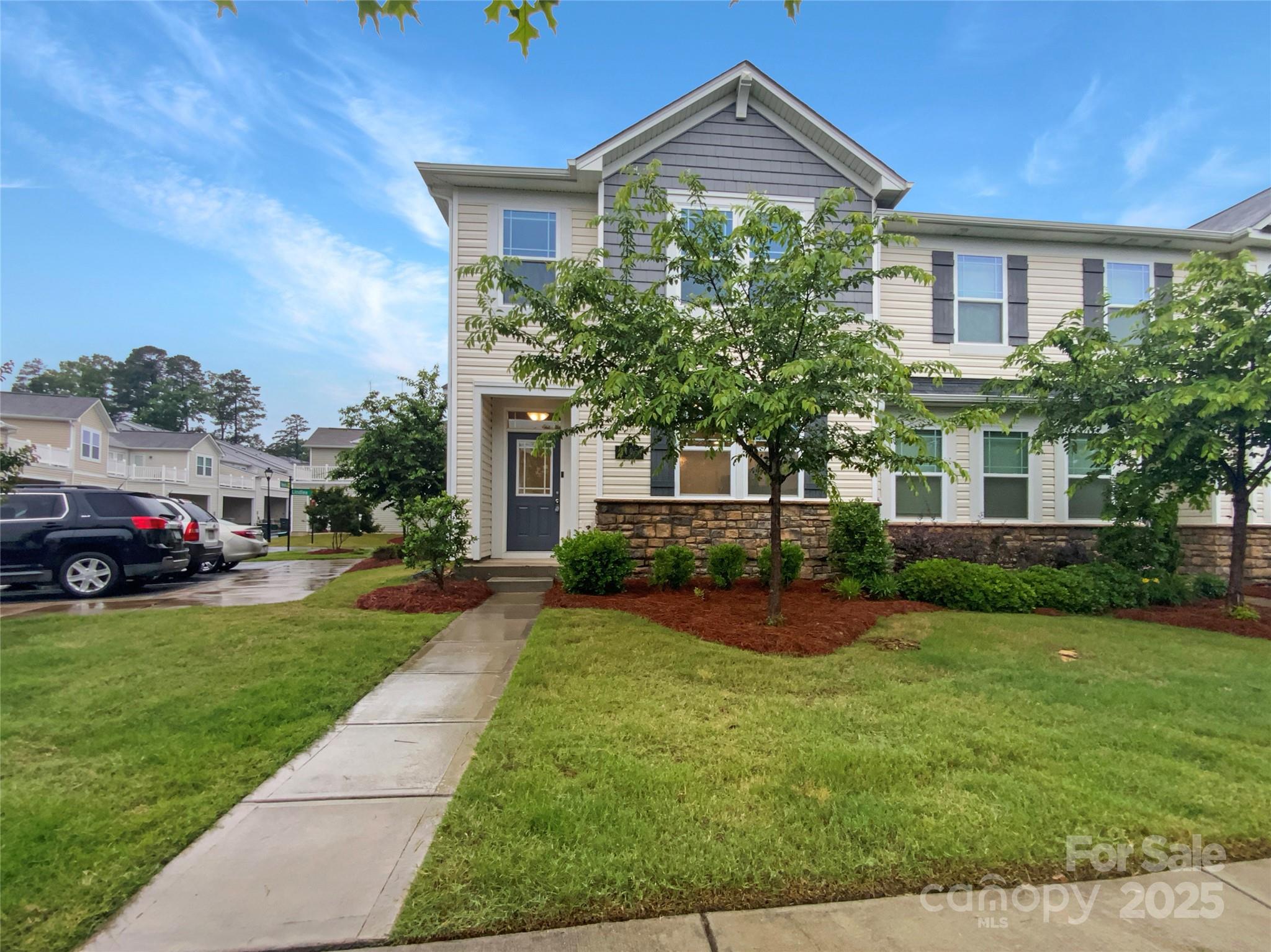 4105 Galloway Road Charlotte, NC 28262 - Photo 1 of 23 a front view of a house with a yard