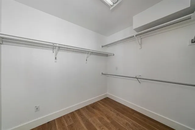 a view of a room with racks on the wall