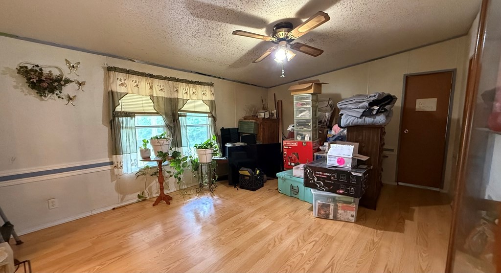 920 Pioneer Road Grimsley, TN 38565 - Photo 9 of 15 a living room with furniture and wooden floor