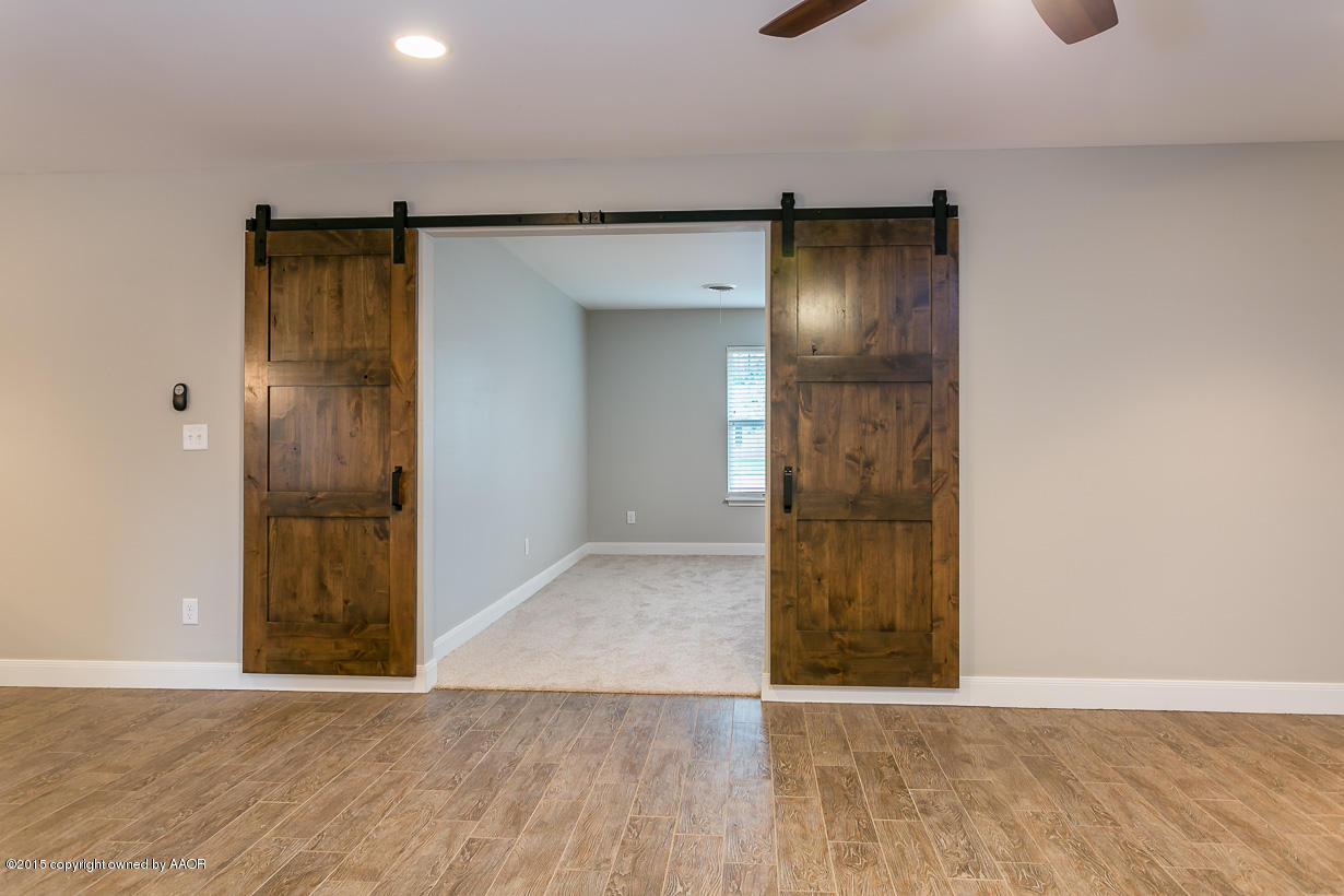 6103 Elmhurst Road Amarillo, TX 79106 - Photo 8 of 26 Den Doors into Front LA
