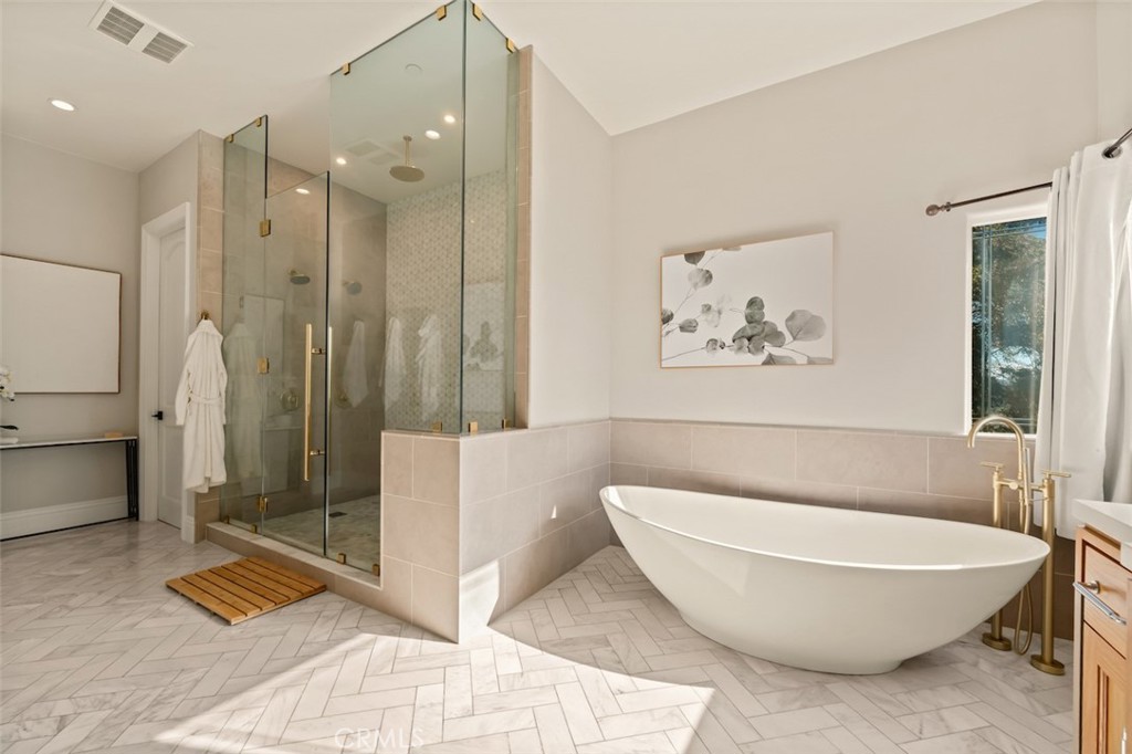 13248 Nightsky Drive Camarillo, CA 93012 - Photo 27 of 53 a bathroom with a bathtub and shower