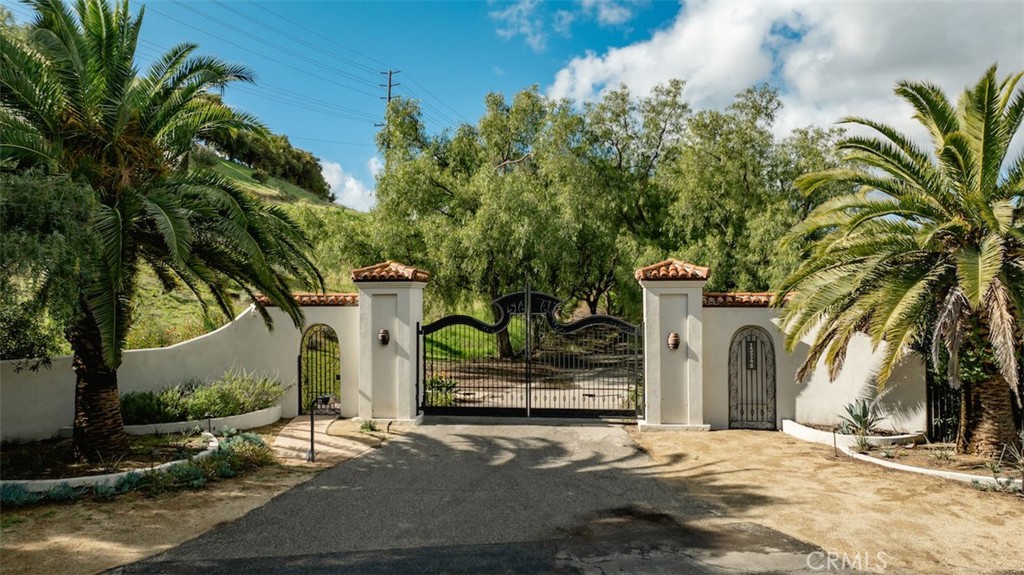 13248 Nightsky Drive Camarillo, CA 93012 - Photo 3 of 53 a view of a street with palm trees