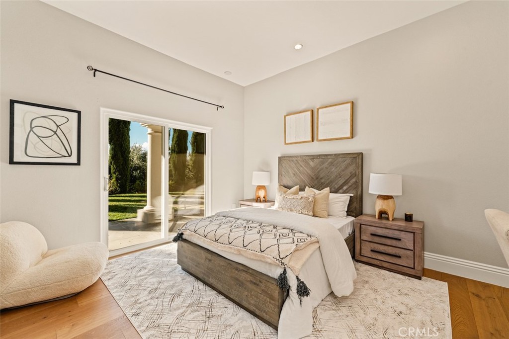 13248 Nightsky Drive Camarillo, CA 93012 - Photo 36 of 53 a bedroom with a large bed and a couch