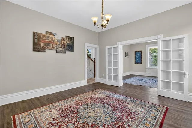 a view of a livingroom with wooden floor