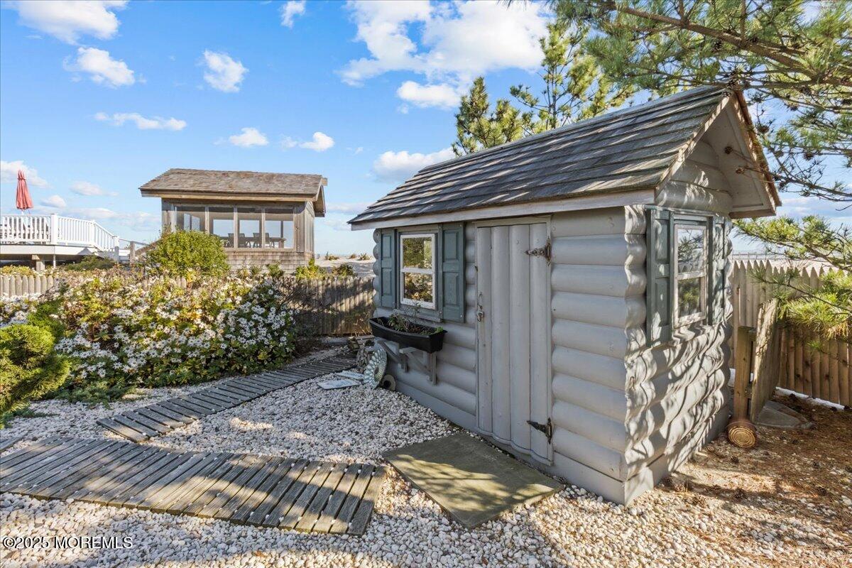 262 Sunset Lane Mantoloking, NJ 08738 - Photo 20 of 45 a view of house with a tree