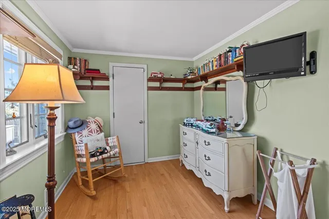 a bathroom with a toilet a sink and a mirror