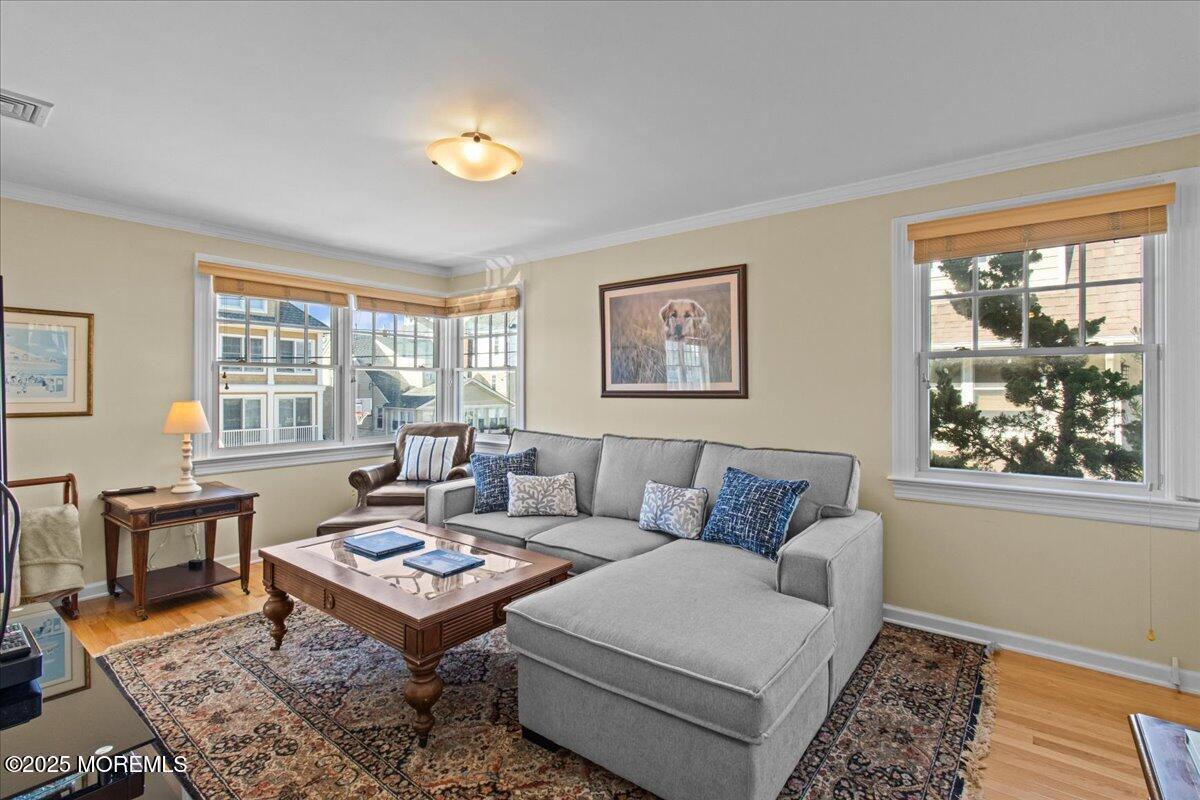 262 Sunset Lane Mantoloking, NJ 08738 - Photo 32 of 45 a living room with furniture and a window
