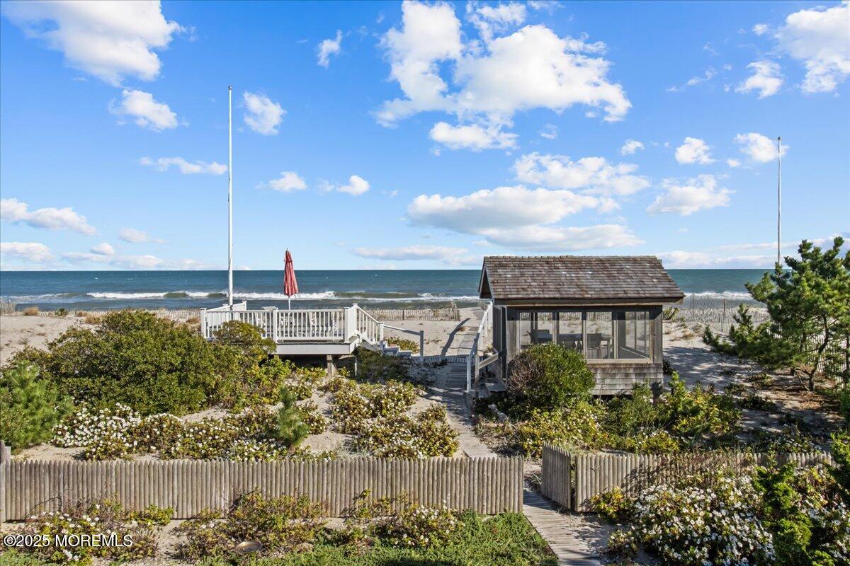 262 Sunset Lane Mantoloking, NJ 08738 - Photo 41 of 45 a front view of a house with a lake view