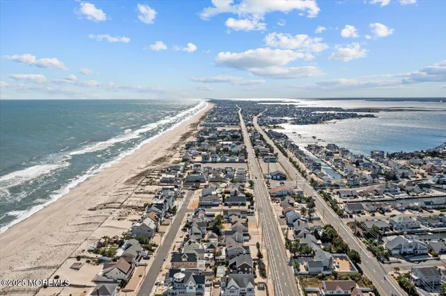a view of multiple houses with a street