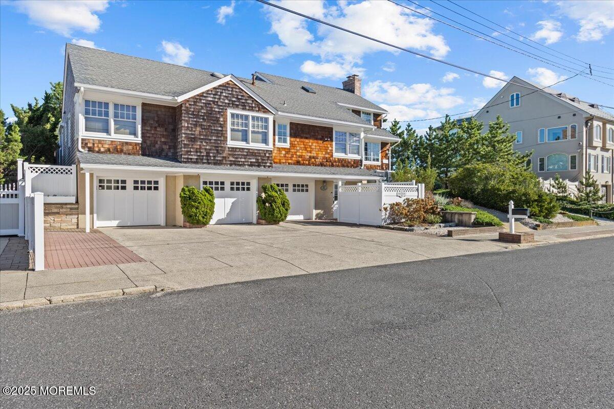 262 Sunset Lane Mantoloking, NJ 08738 - Photo 45 of 45 a view of multiple houses with a street
