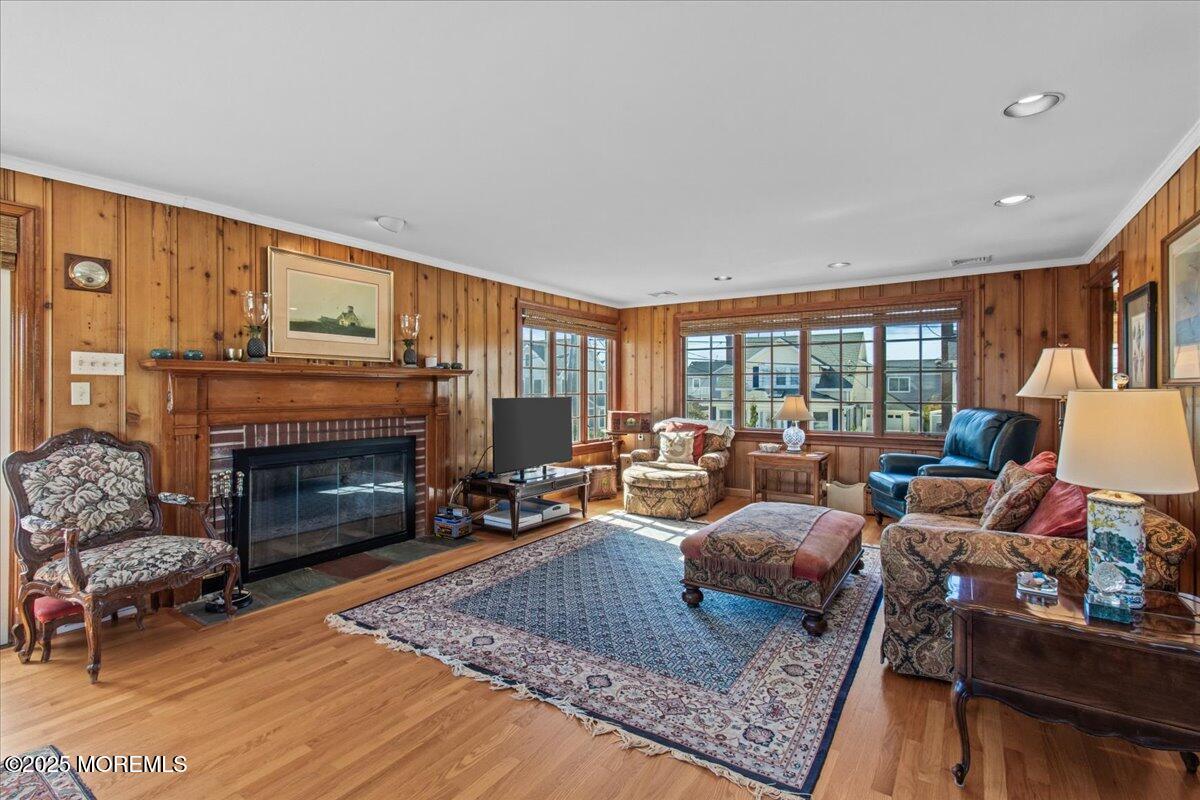 262 Sunset Lane Mantoloking, NJ 08738 - Photo 5 of 45 a living room with furniture and a fireplace